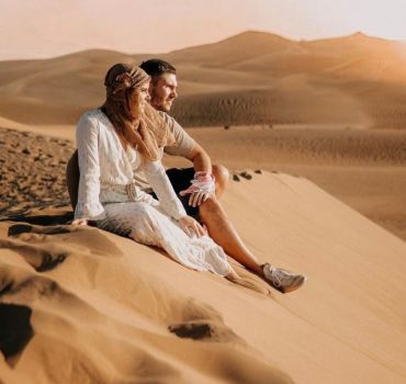 Red Dunes Desert Safari with Camel Ride, Sand Boarding, BBQ Dinner &amp; Entertainment