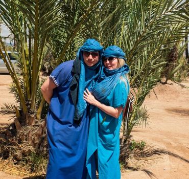 Sunset Camel Ride in the Palm Grove of the city